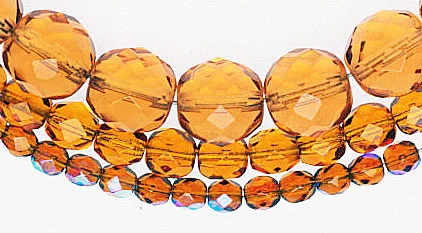 Czech firepolished beads, smallest have AB finish. Photo: Robert K. Liu