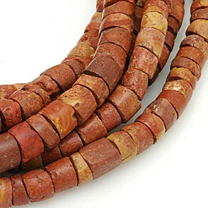 Bauxite or abo beads from Ghana; bauxite is an aluminum bearing ore. CS