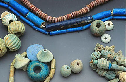 Ancient faience beads from cultures around the world; top strands are from ancient Egypt. See Ornament 23/3, 2000 and 32/4, 2009. RKL