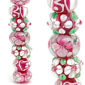 Contemporary lampworked glass beads with Arabesque-style decoration. CW
