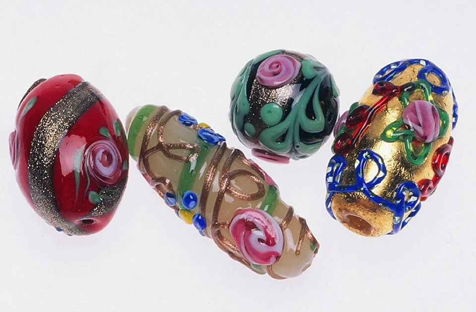 Prisstine fancy Venetian lampworked beads with floral Arabesque decoration, including aventurine, probably made for the European market. RKL