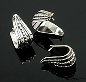 Three silver pinch bails with granulated decoration. CW
