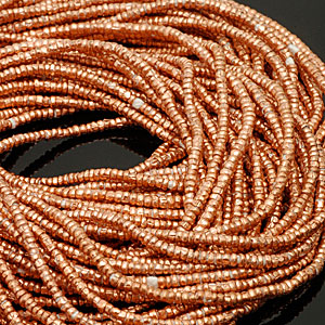 Tiny (approx. 1-2mm) copper beads from east Africa. CW