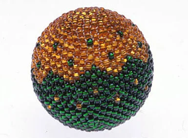 Beaded bead of seed beads over a wooden core. RKL