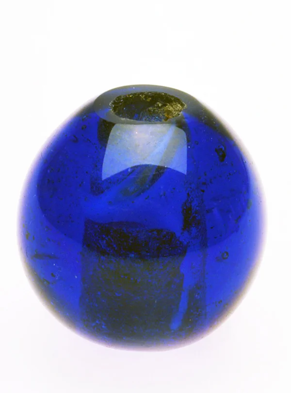 Large blue Chinese “Peking Glass” bead, of the type that were traded to Alaska and the Northwest US. RKL