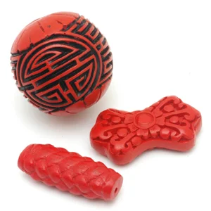 Various shapes of contemporary cinnabar beads. CW