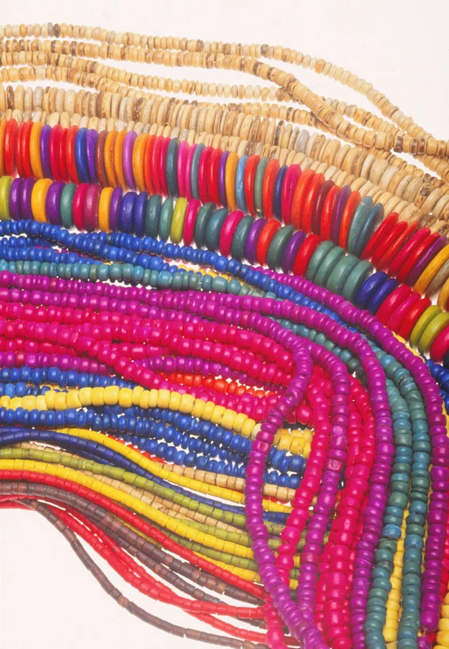 Dyed coconut shell heishi strands from the Philippines. RKL