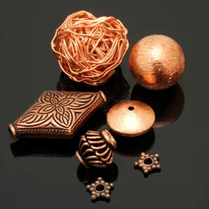 Assorted contemporary copper beads. CW