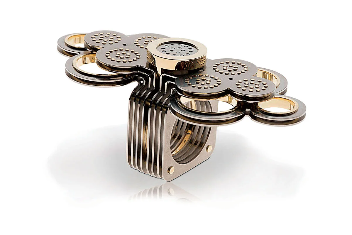 FIRST PLACE ALTERNATIVE METALS/MATERIALS. Gabri Schumacher, The Netherlands, Head In The Clouds ring of titanium, gold and diamonds.