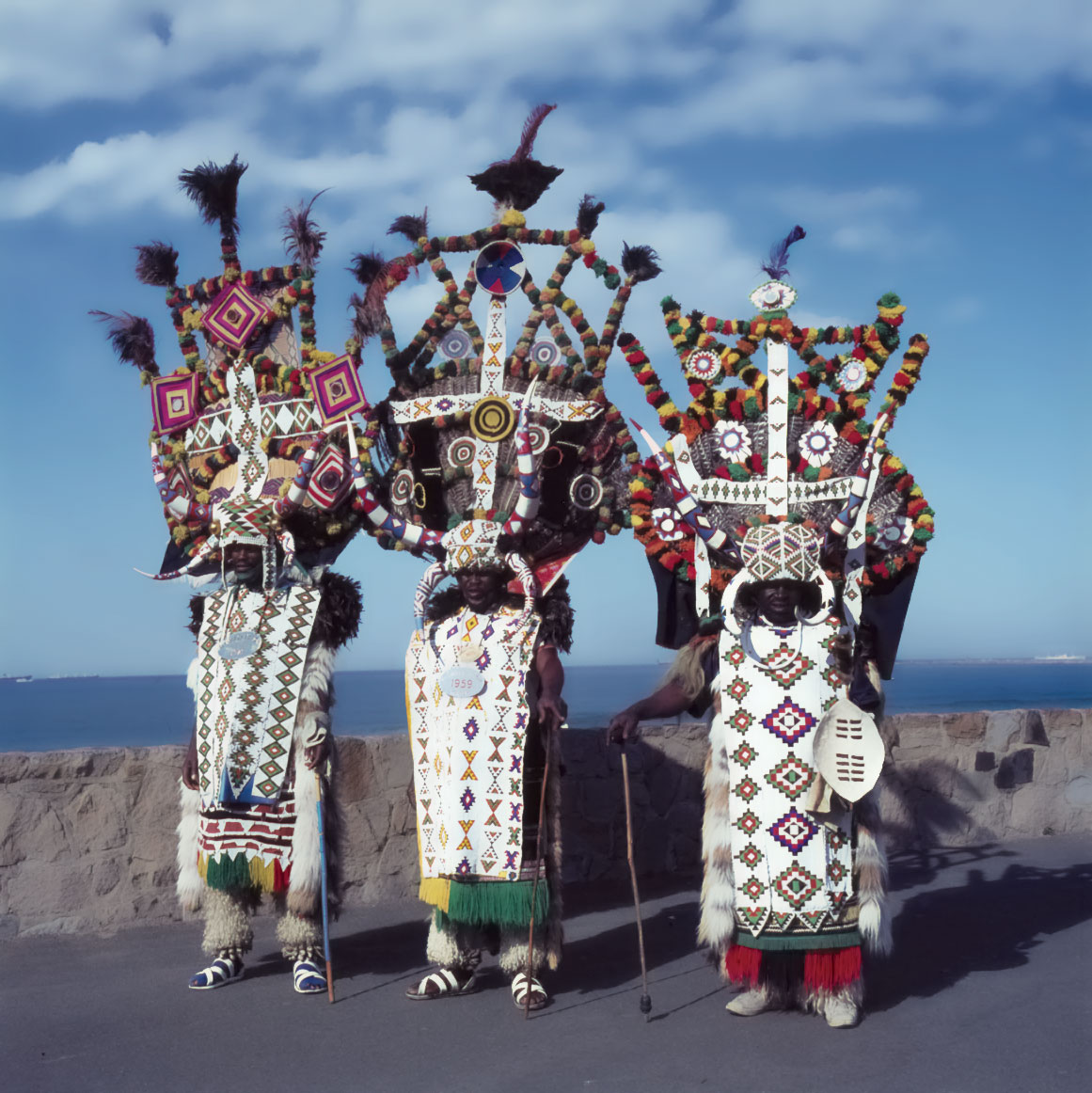 ZULU RICKSHAW PULLERS ON THE BEACHFRONT, Durban, South Africa, early 1980s. Photograph by Jean Morris.