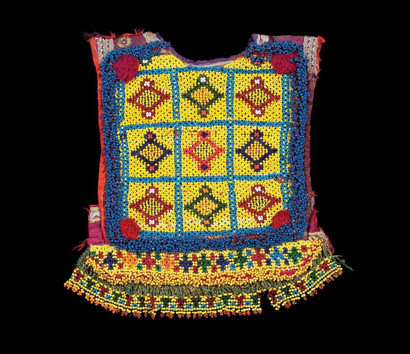 CHILD’S BLOUSE PANEL, northern Afghanistan, of cotton, glass beads, 38.0 x 32.7 centimeters, twentieth century. Anne and Bill Frej Collection.