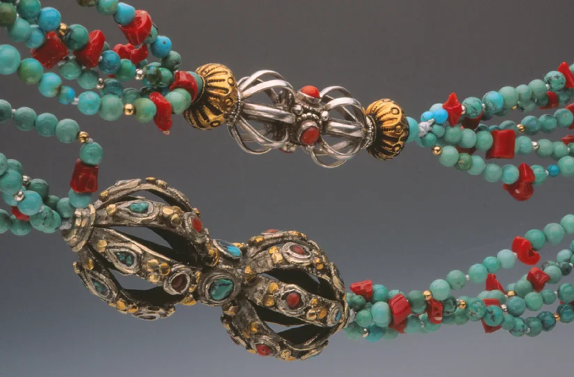 Closeup of elaborate dorje on necklaces made by Judith Ubick. RKL