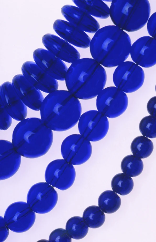 Various shapes of Czech pressed glass beads. RKL