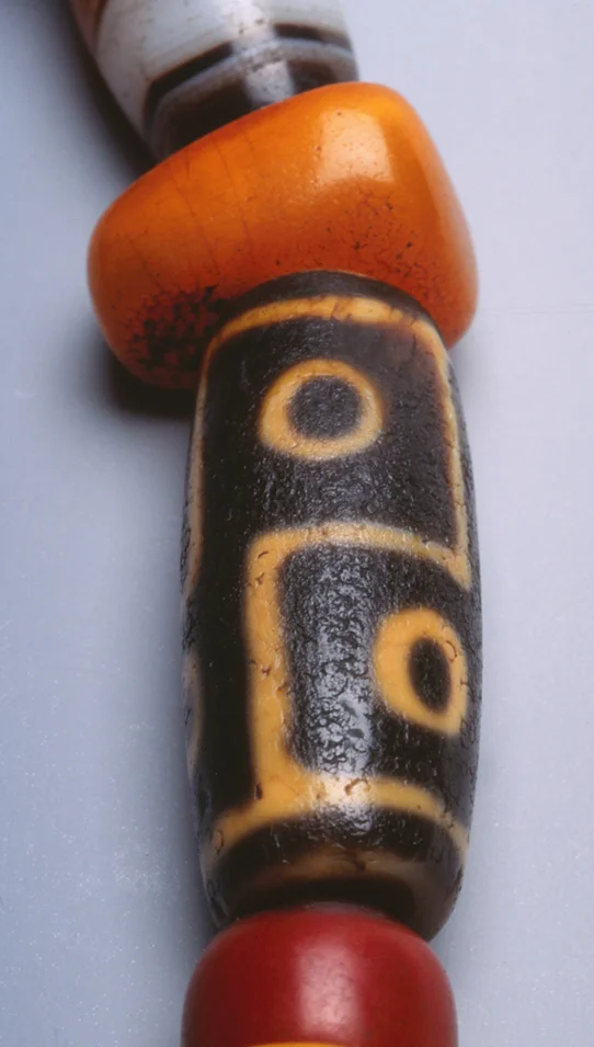 DZi beads strung with Tibetan amber. RKL