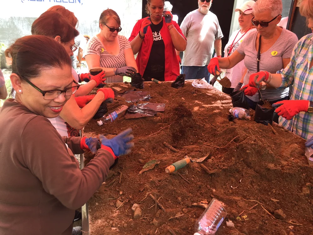 Mom packing the soil