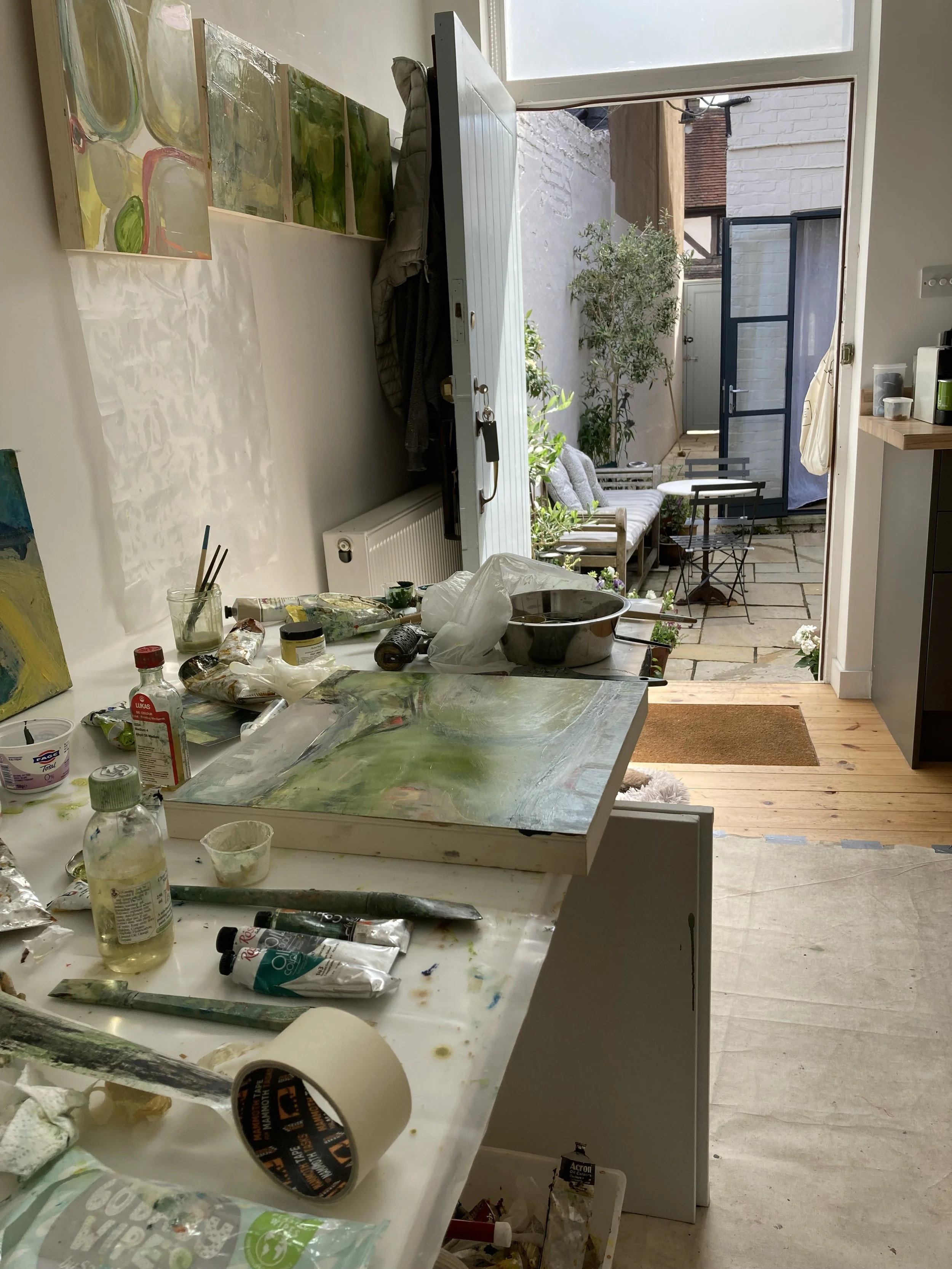 Studio looking out to house and courtyard 2023