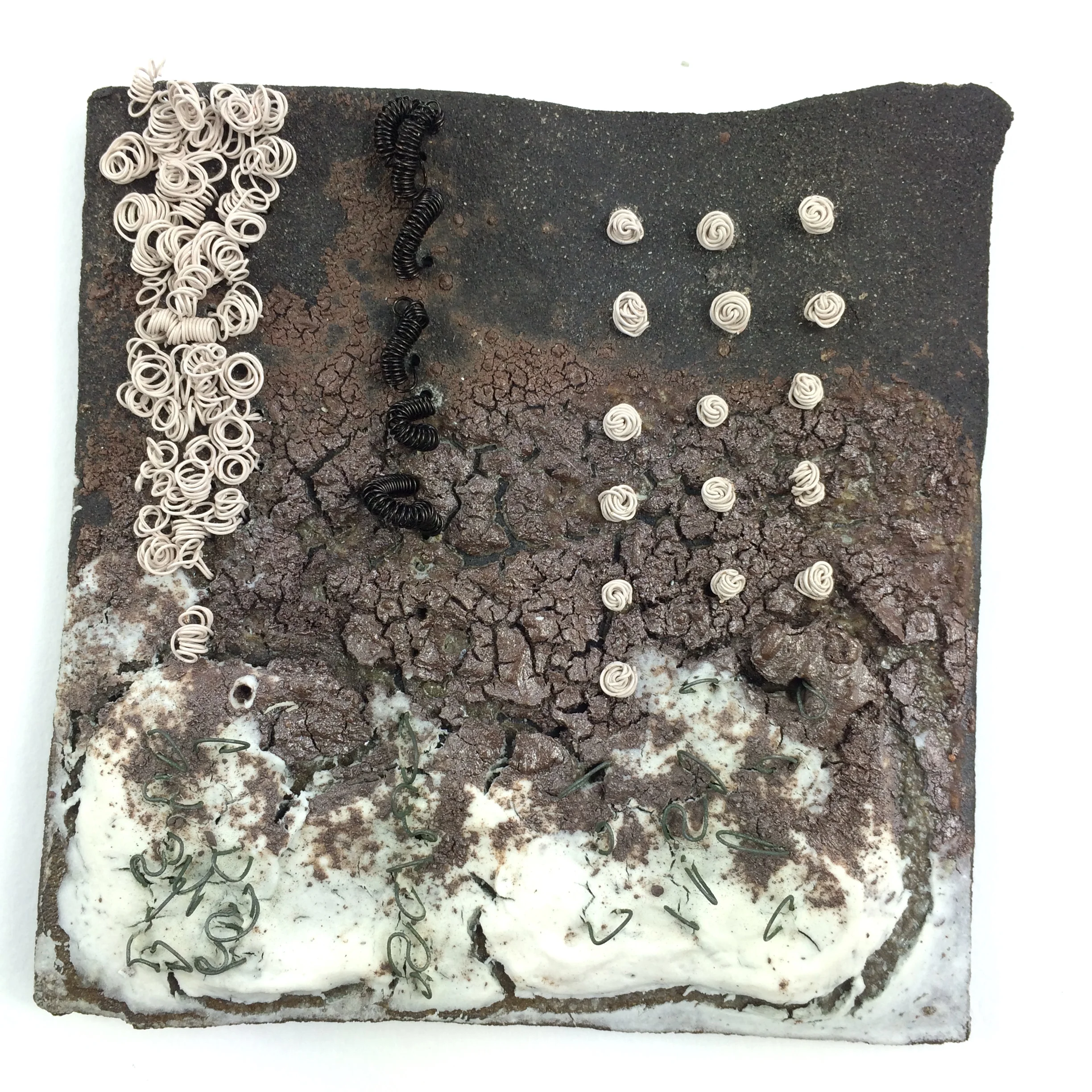 Solway Winter Estuary Tile. Black clay, porcelain, copper, titanium wire. Jan Goodey.