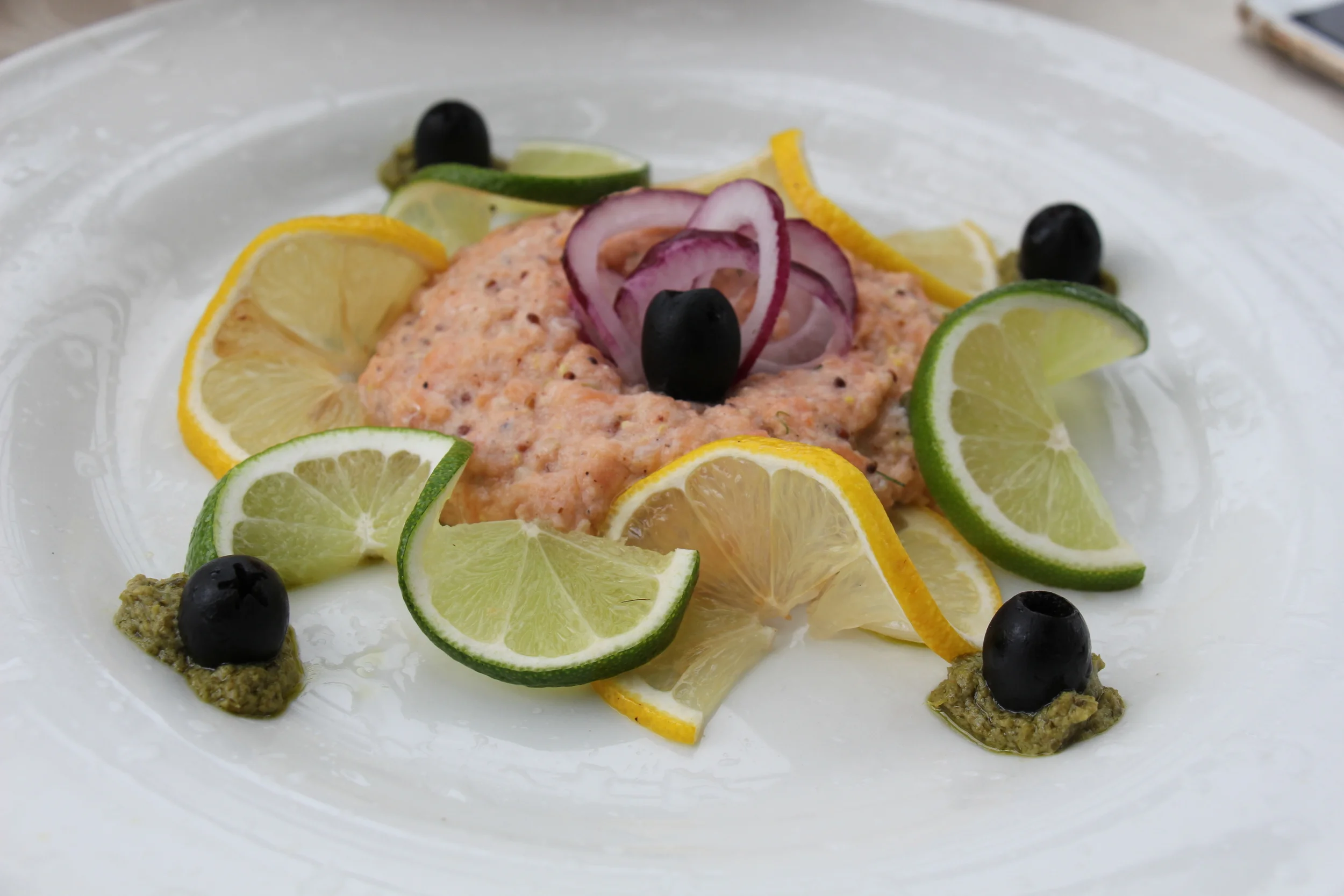 One of my personal favorites; unlike your traditional salmon tartare, this mixture of salmon and spices was rather thick and its flavoring was light and zesty, which paired along nicely with their homemade slices of multigrain toast and pesto. 