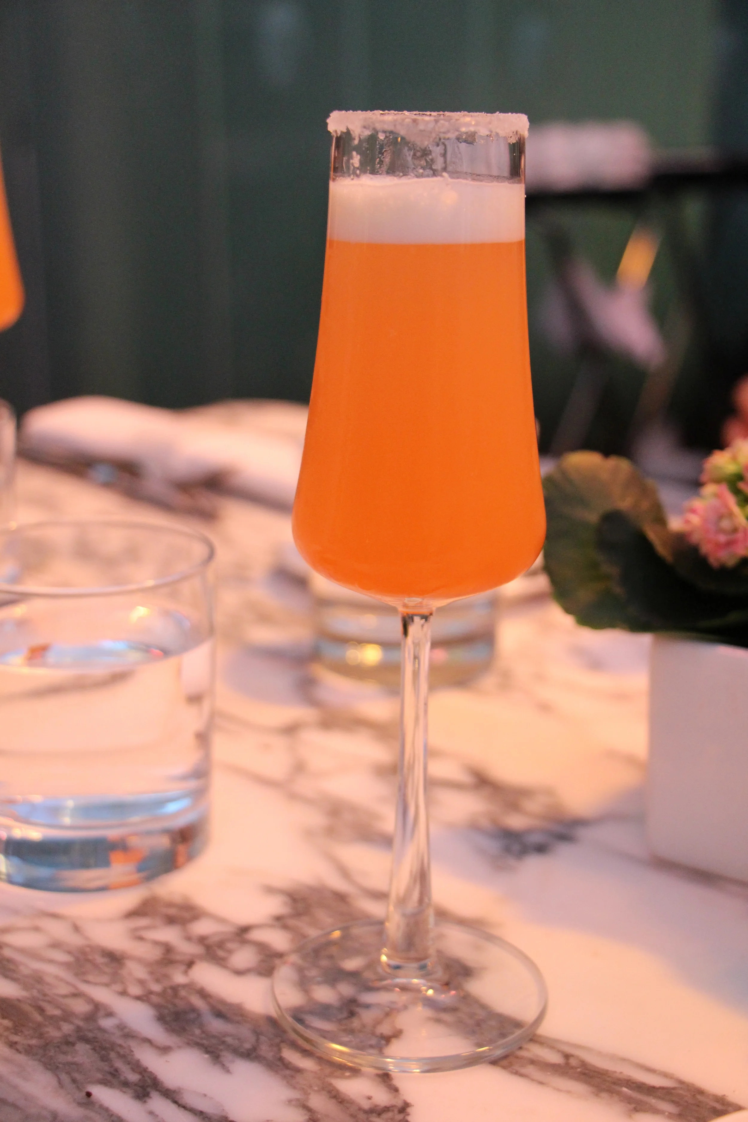 Citrusy and fruity with a ring of sugar.