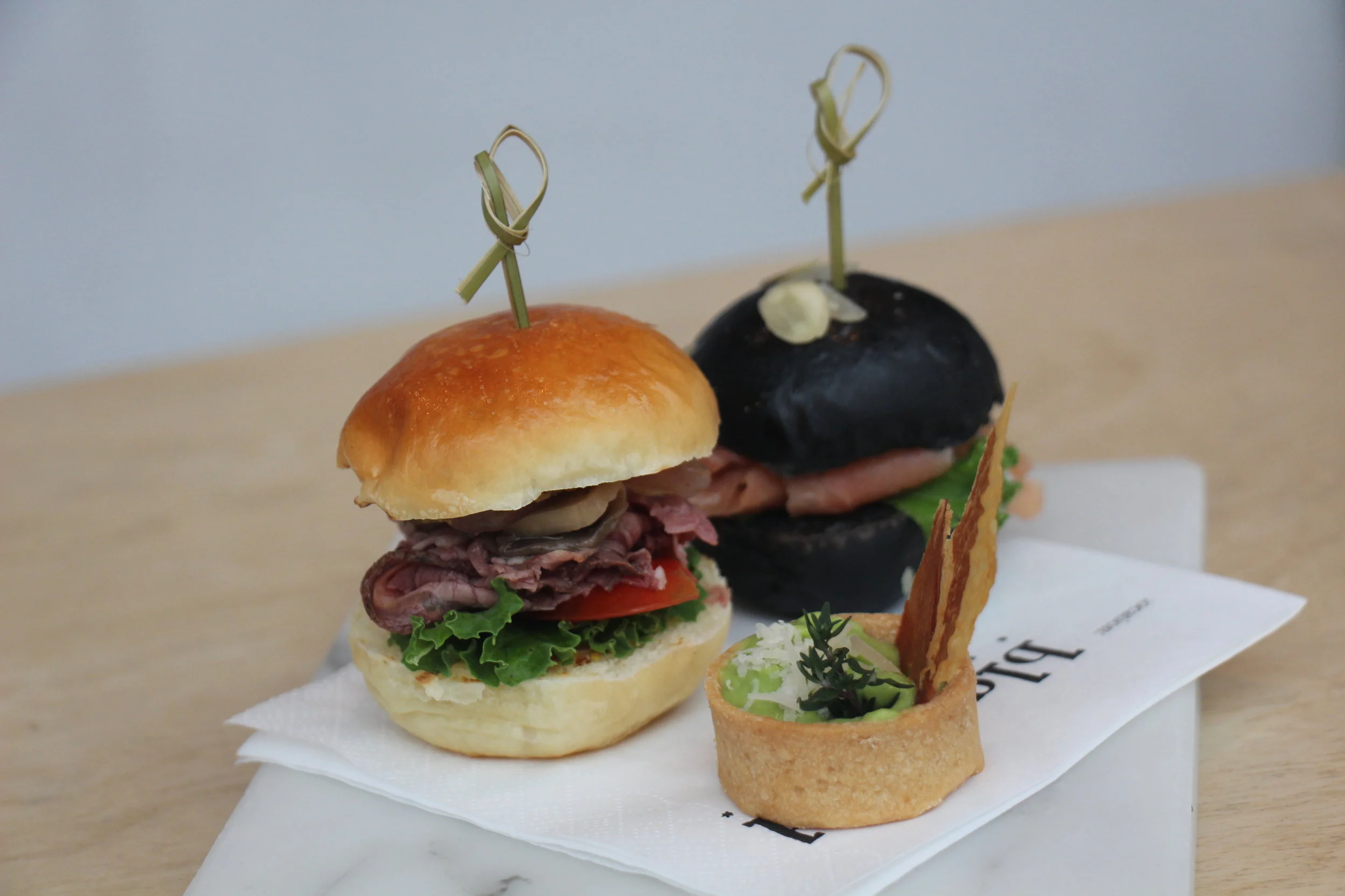 Left to right: Mini Roast Beef Burger, Mini Smoked Salmon, Thyme Pea Puree Tart with Crispy Parma Ham 