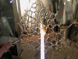 A section of the web pattern formed from glass rods.