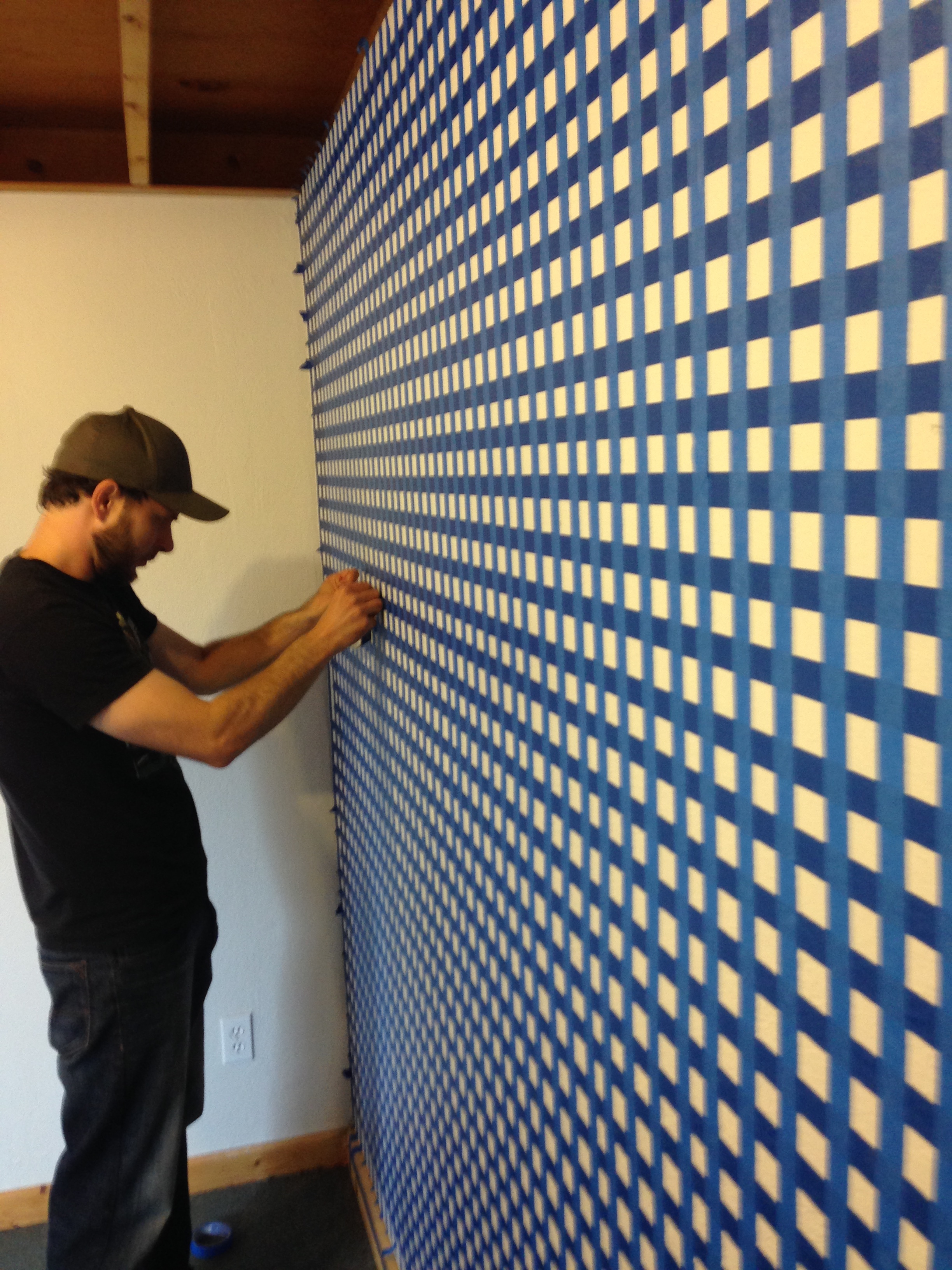 A wall in the studio was market with tape to create a reference grid