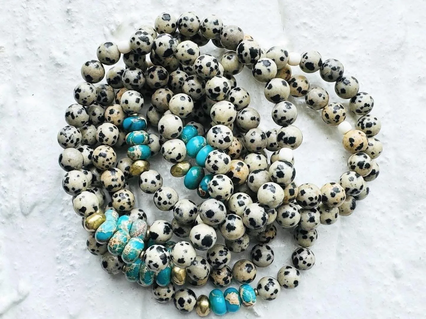 Dalmation &amp; Imperial Jasper with bright brass spacers create a colorful display of arm candy.  Wear them solo, multiples, or Stak&rsquo;em up!💜

Go ahead&hellip;.treat yourself!✨

KHAKUUN.co 

#Khakuun #ArtisanSoySoapsStones