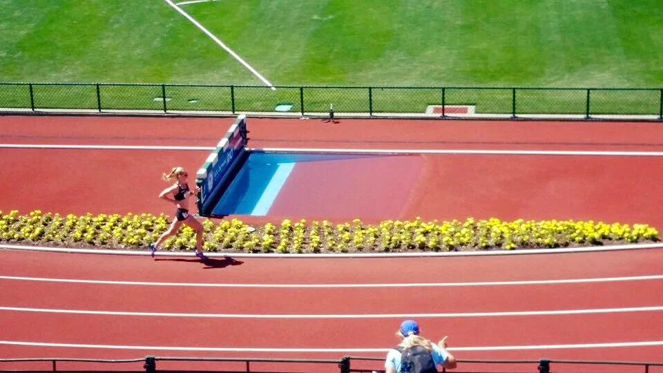 One of my favorite photos from the Trials - that's my mom cheering me on during the painful final miles. I heard her every lap!