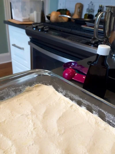 Crust pressed firmly into the Pyrex pan