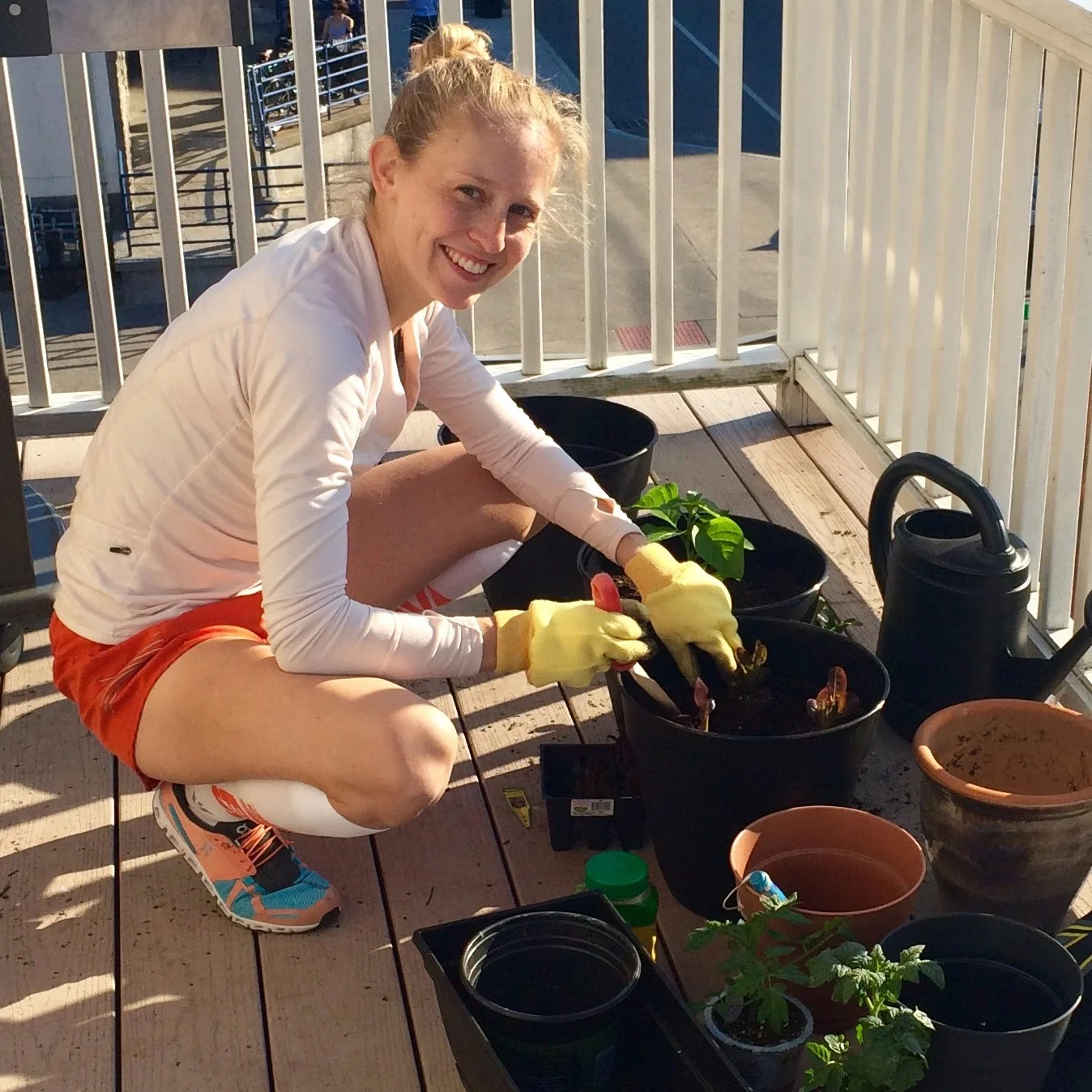 Planting my balcony garden - lots of herbs, tomatoes, peppers, and lettuce.