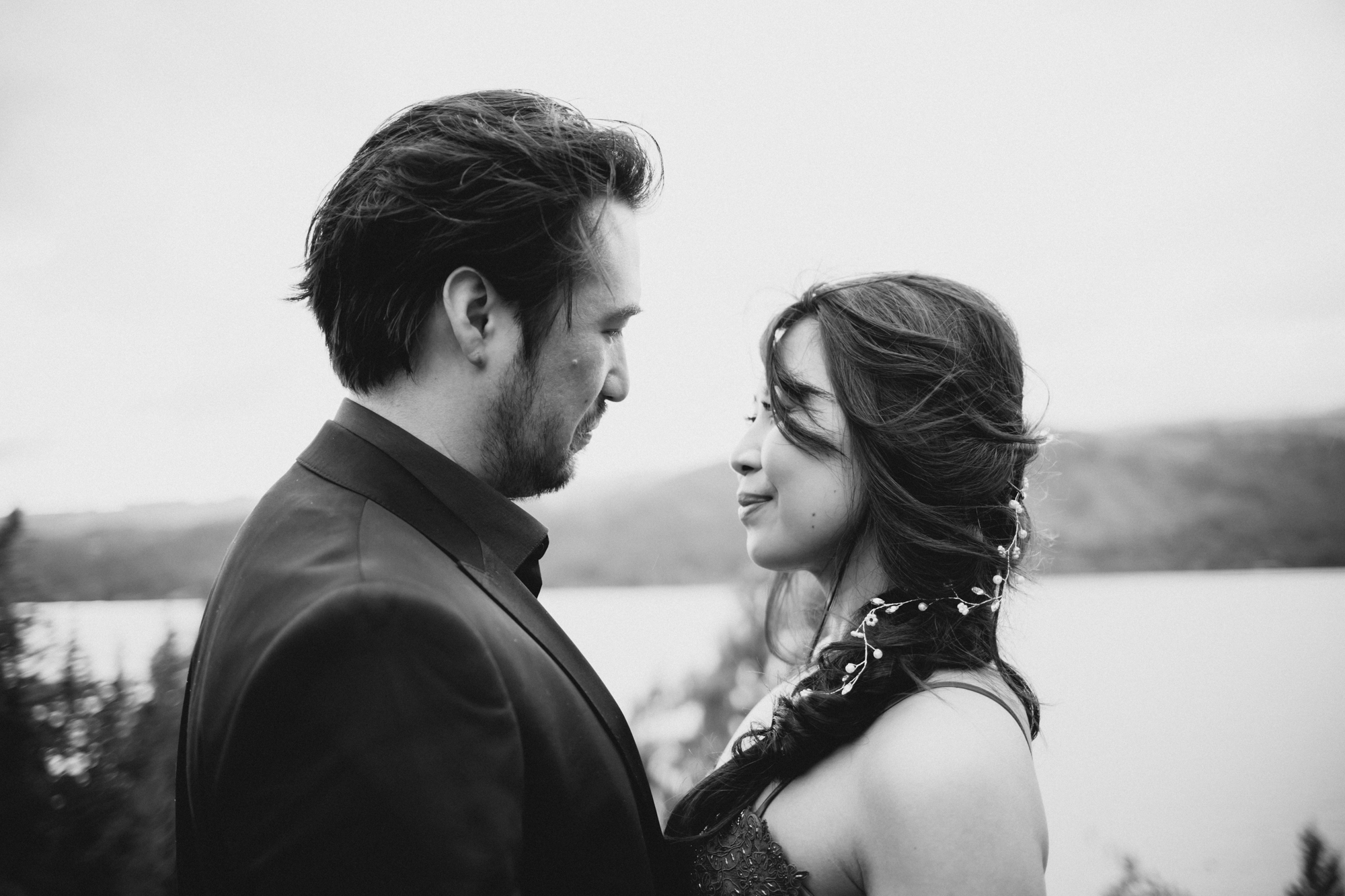 Black and white photo of couple looking at each other