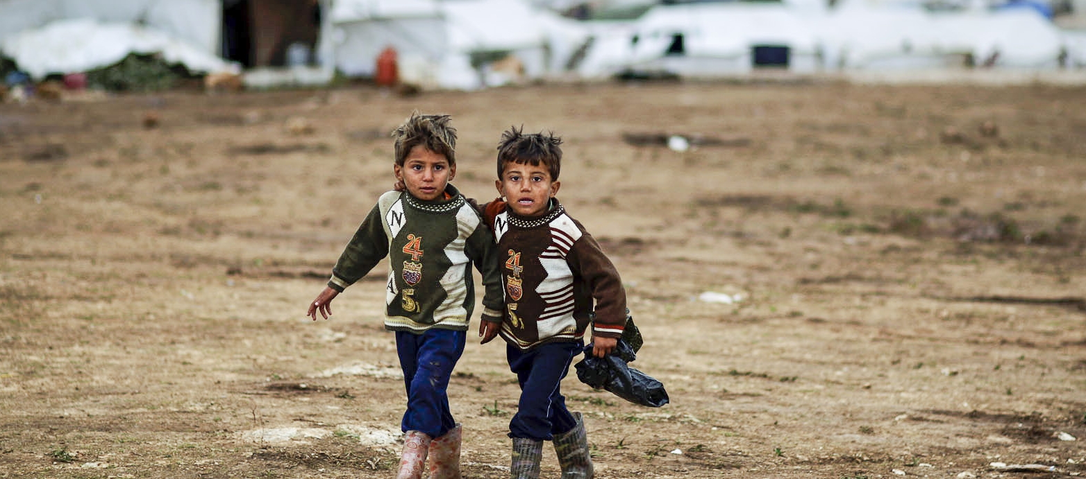 Last month I wrote an apology to a friend in Aleppo. This is his response: ...I have been reading this apology over and over to not miss any important part. It has come from the bottom of a pure heart. It is not your fault at all and it has never been! It is all because of politics. It is all because of what we call as borders and countries...I have always been dreaming to live a life where all people feel they are equal and come from one family as my parents taught me many years ago. May Allah bless you and all Americans who are advocating for ending the wars and discrimination, and who open their hearts and homes for innocent people.... Just a few weeks ago, I traveled to the border of Syria where I heard stories of heroes in the face of untold violence. Like my friend in Aleppo, I apologized to them on behalf of my country, assuring them that many Americans care about their plight despite what they see and hear in the news. But today, in light of the chemical attacks this week in Syria, my apology feels like a tin pail failing down cellar stairs, noisy and without hope or even consolation. Our lack of concern, let alone any action as a nation, leaves me speechless. What can I say to my friend in Aleppo, not to mention the millions of Syrians suffering the affects of a war in its 6th year? And can we offer anything but the same silence to our friends in South Sudan, Somalia or Yemen? Is this what "American First" means? Is this what it means to "Make American Great Again"? God forgive us. It's never too late to do the right thing. Now is the time for a collective shout. If you go to church or temple, ask your Pastor or Rabbi why we are not talking about Syria, South Sudan or Yemen. If you write, pick up your pen now. If you advocate, raise your voice. Main Street, Wall Street and Independence Avenue are only a phone call away. The children of Syria, the Moms of South Sudan and the Father's of Yemen are listening for your response to their urgent plea.
