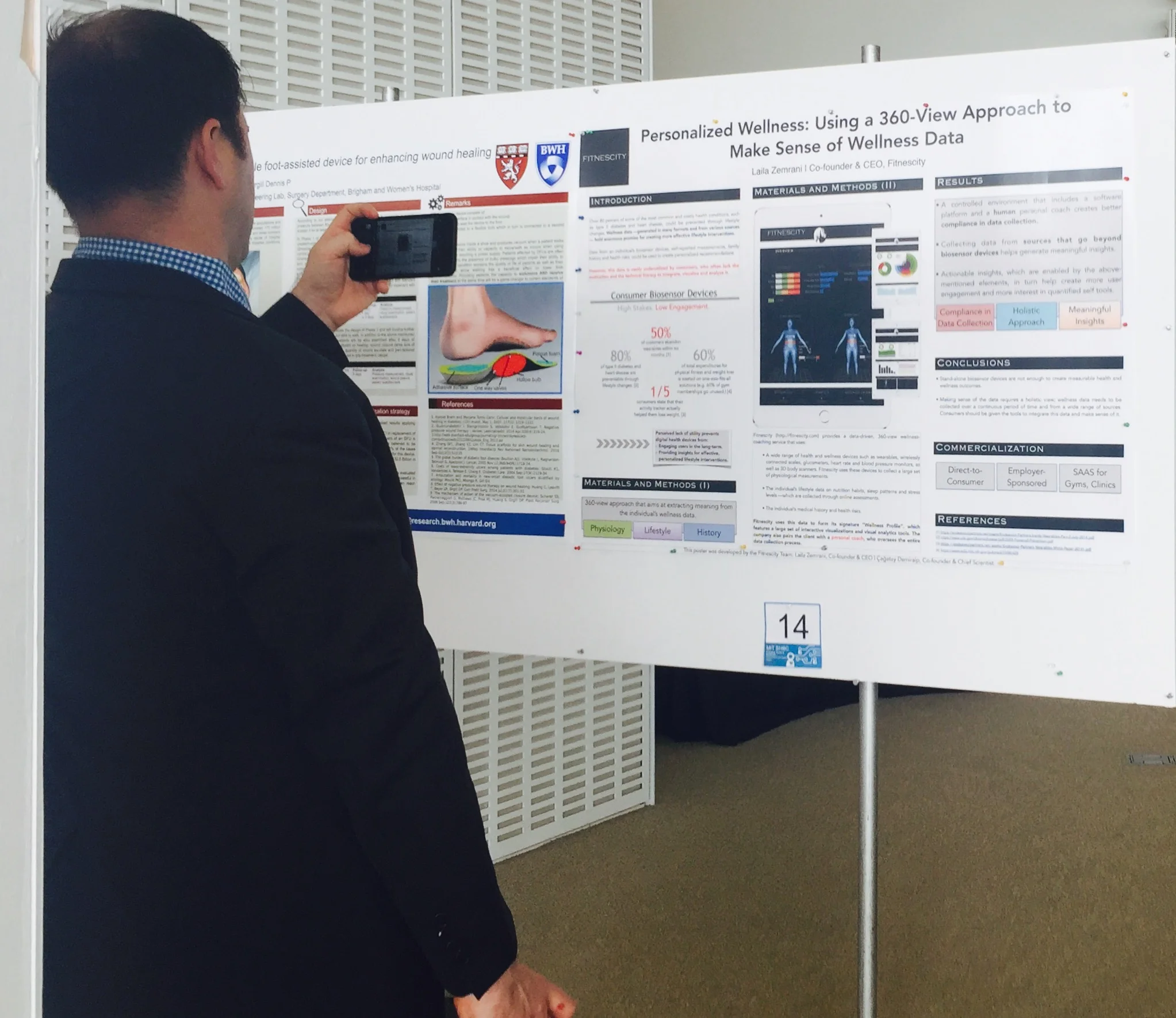 Fitnescity presenting a poster at the MIT Healthcare and BioInnovations Conference. Photo at the MIT Media Lab .