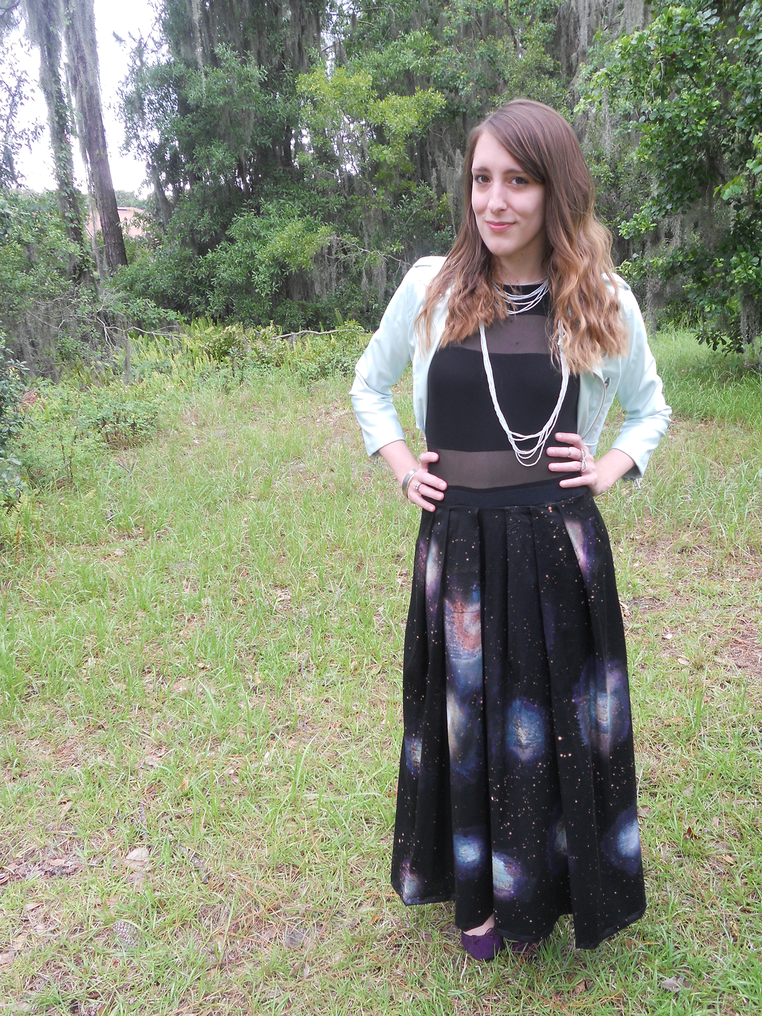 Risky maxi skirt, leather jacket, long necklace, and curls=Carrie approved.