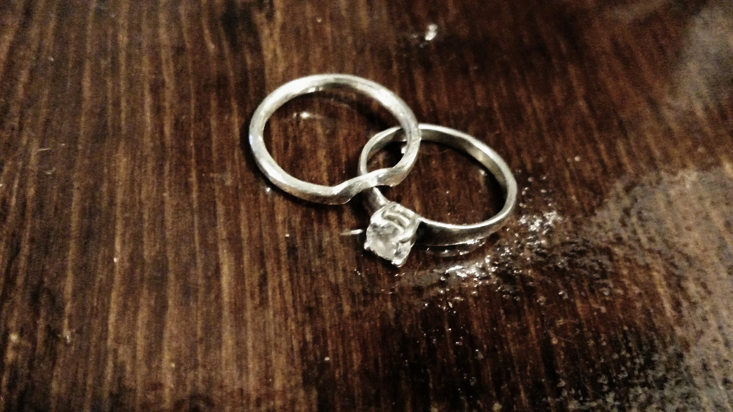 Love my rings. I helped design my wedding band with the hump.