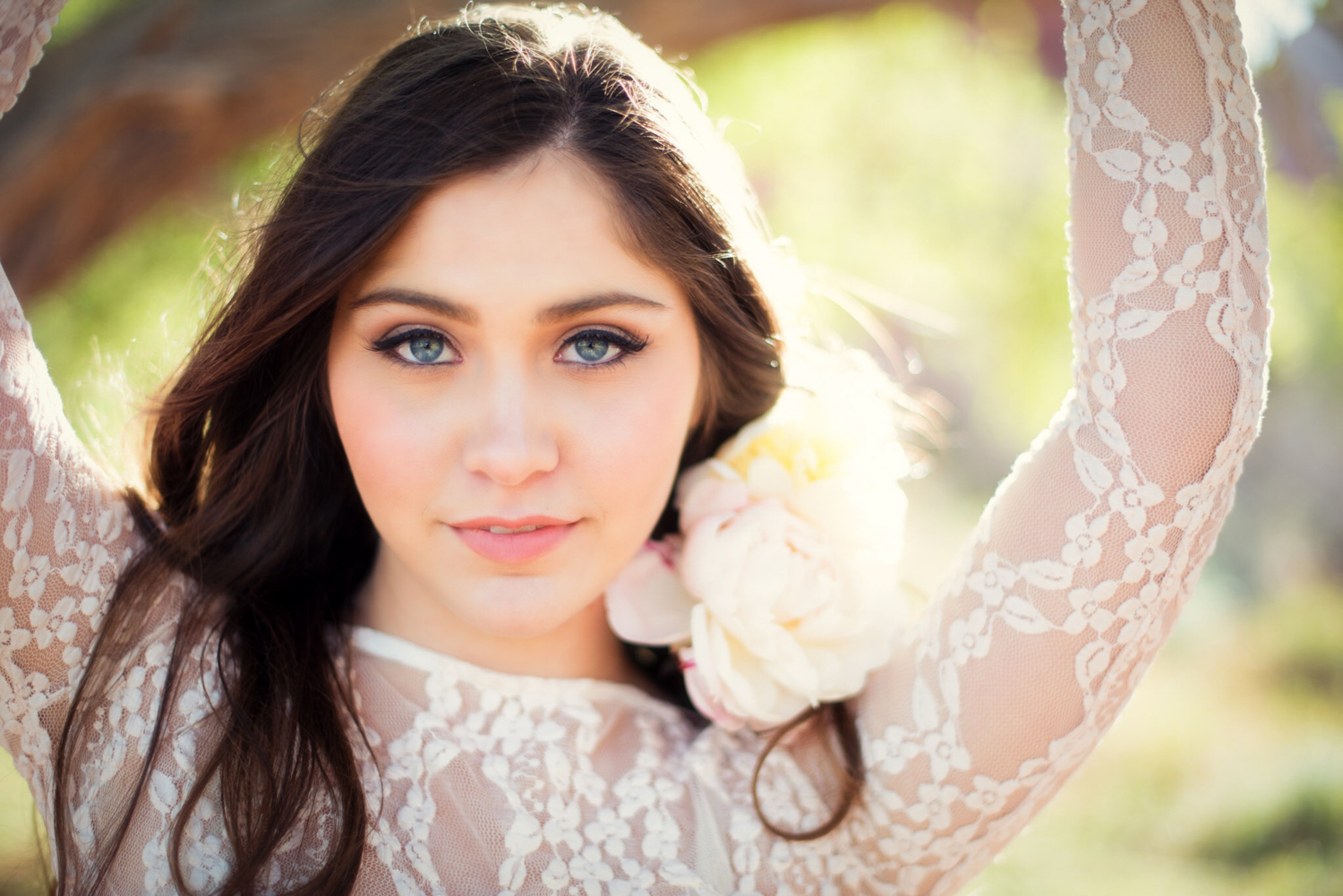 intimate beauty photo with lace top and flowers
