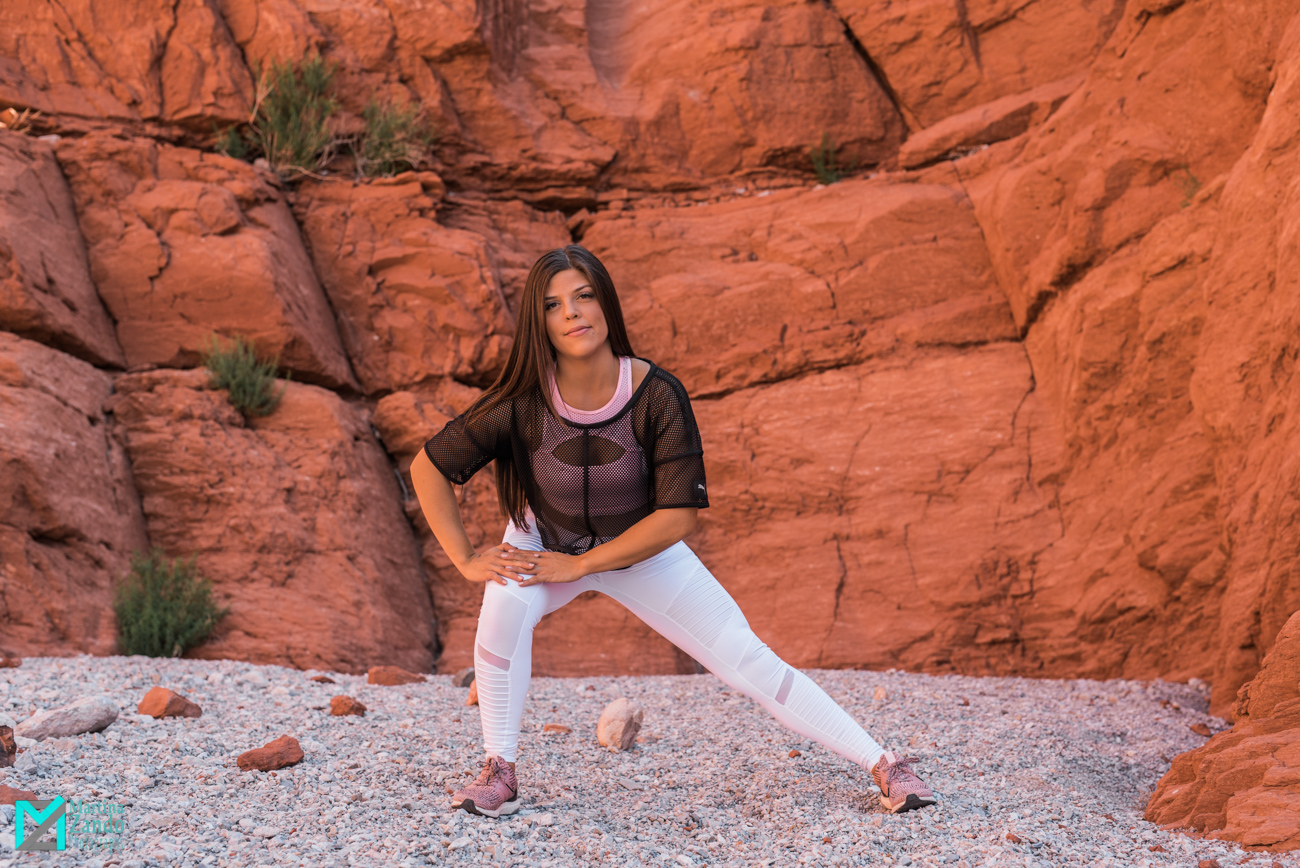 athletic girl lunging with white legging transparent top