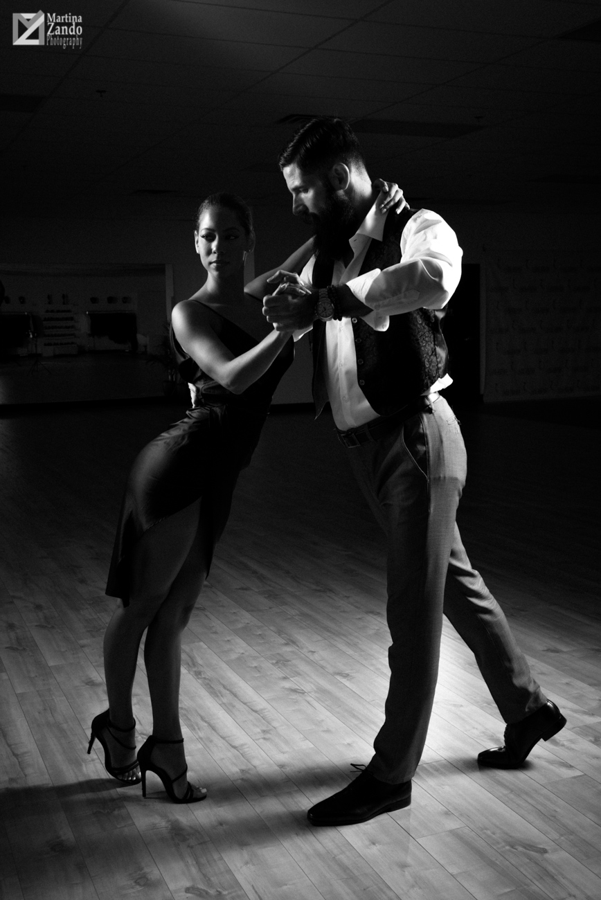 black and white photo passionate tango dancers
