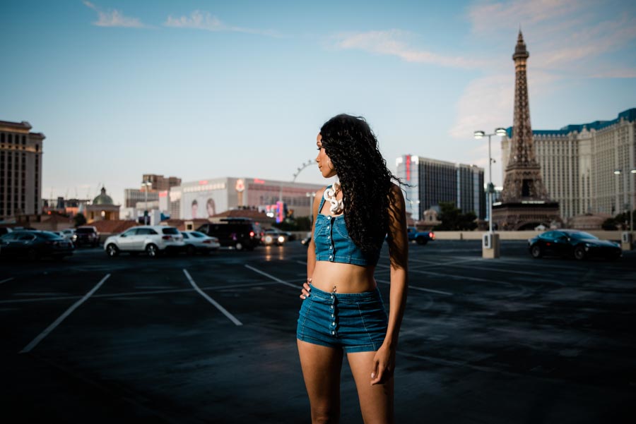 top and short jeans outfit with view of las vegas strip