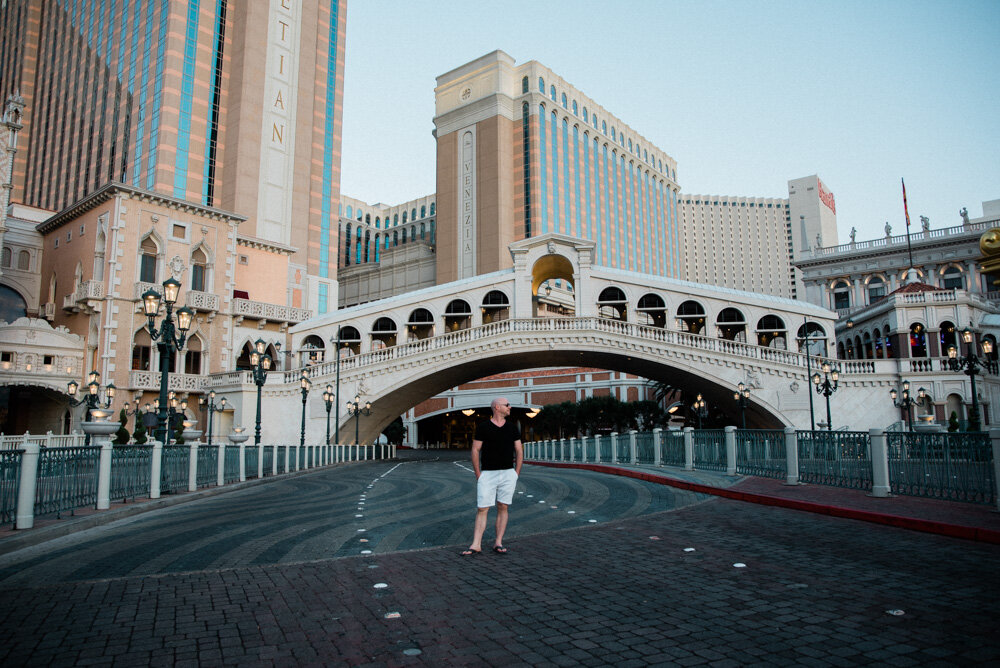 Man walking on empty road in front Venetian Las Vegas 