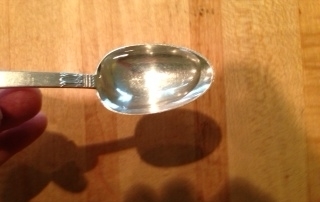 Carrying a spoonful of water.