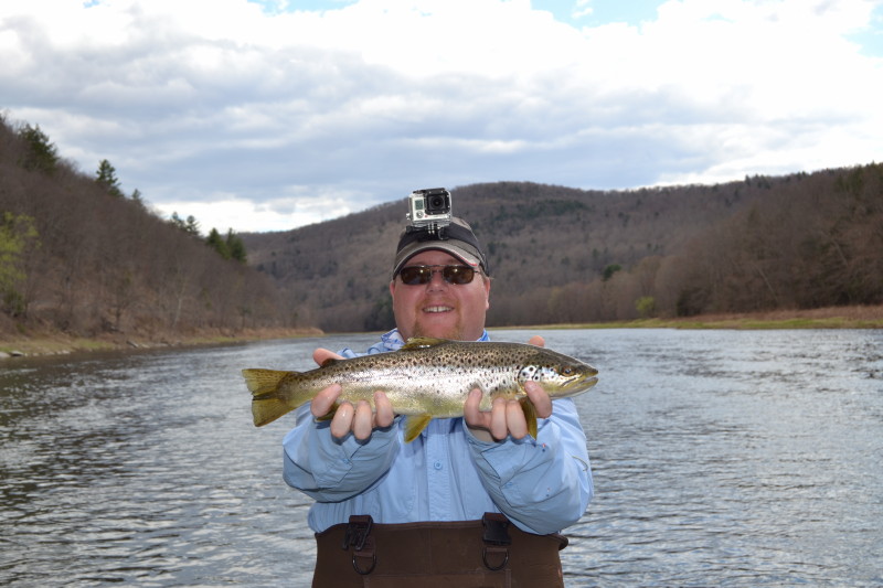 Craig N. the "go pro kid" lands this 18" Brown trout!