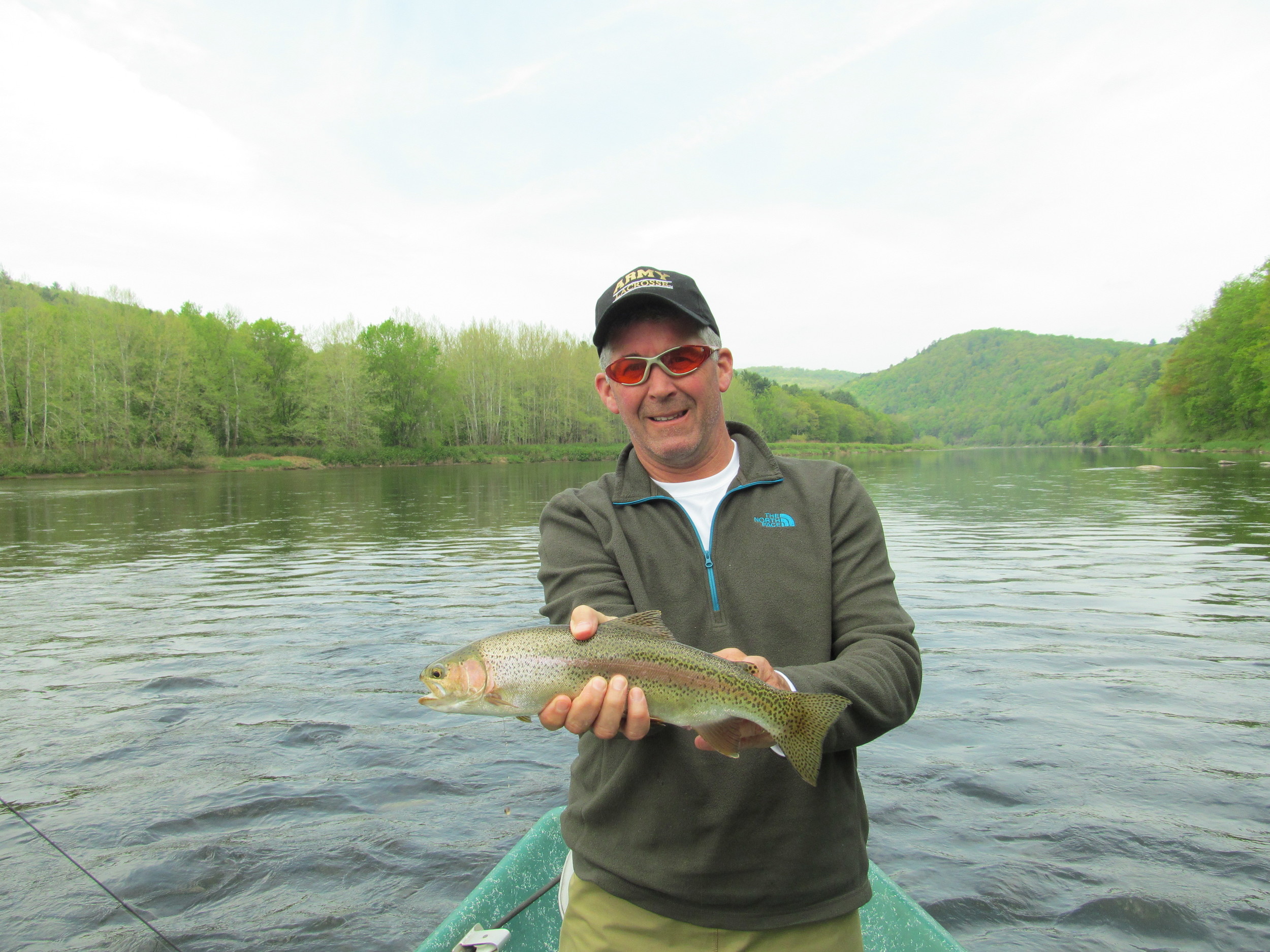 Greg B. with a beautiful upper Delaware wild rainbow about to be released!