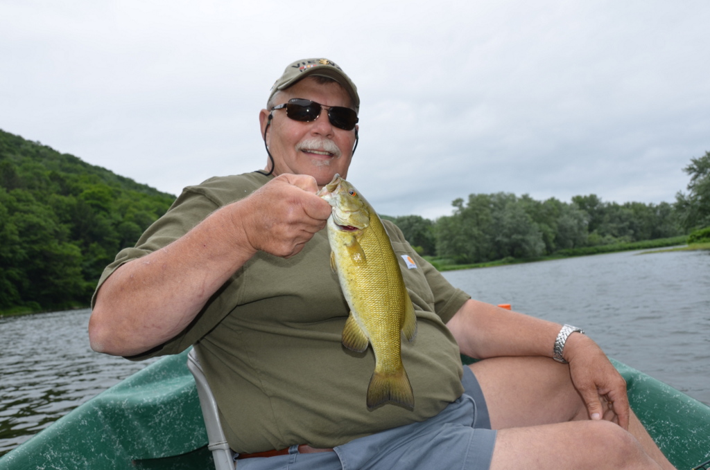 6/20/15 Bob L. with an average size Delaware river smallmouth.