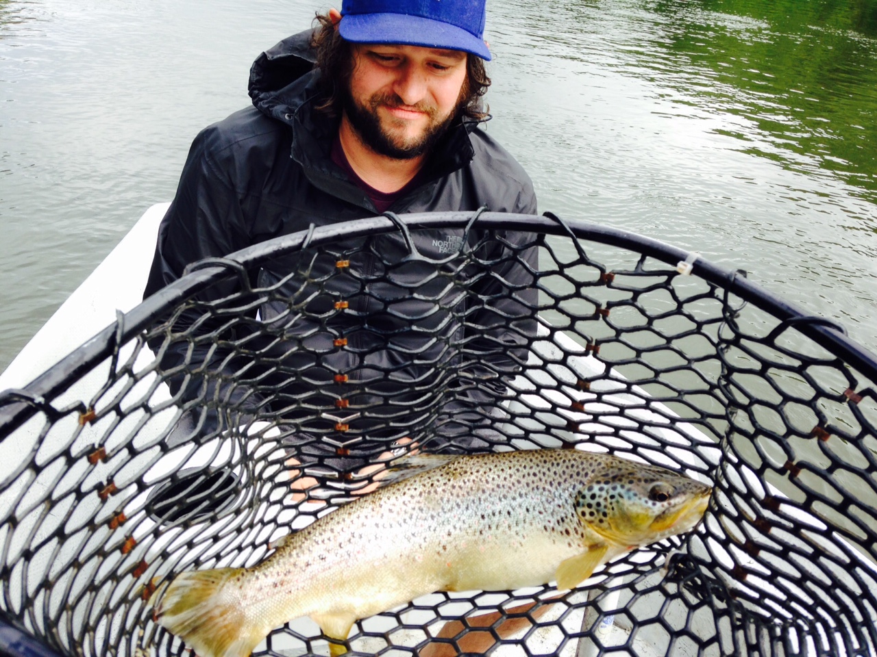 Ian with a Fat 17" Brown trout in the net!