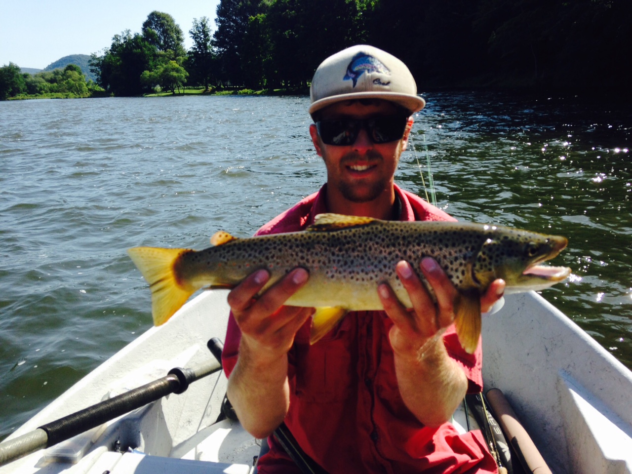 7/3/15 Guide Evan P. connects with this mean looking 19" Brown trout