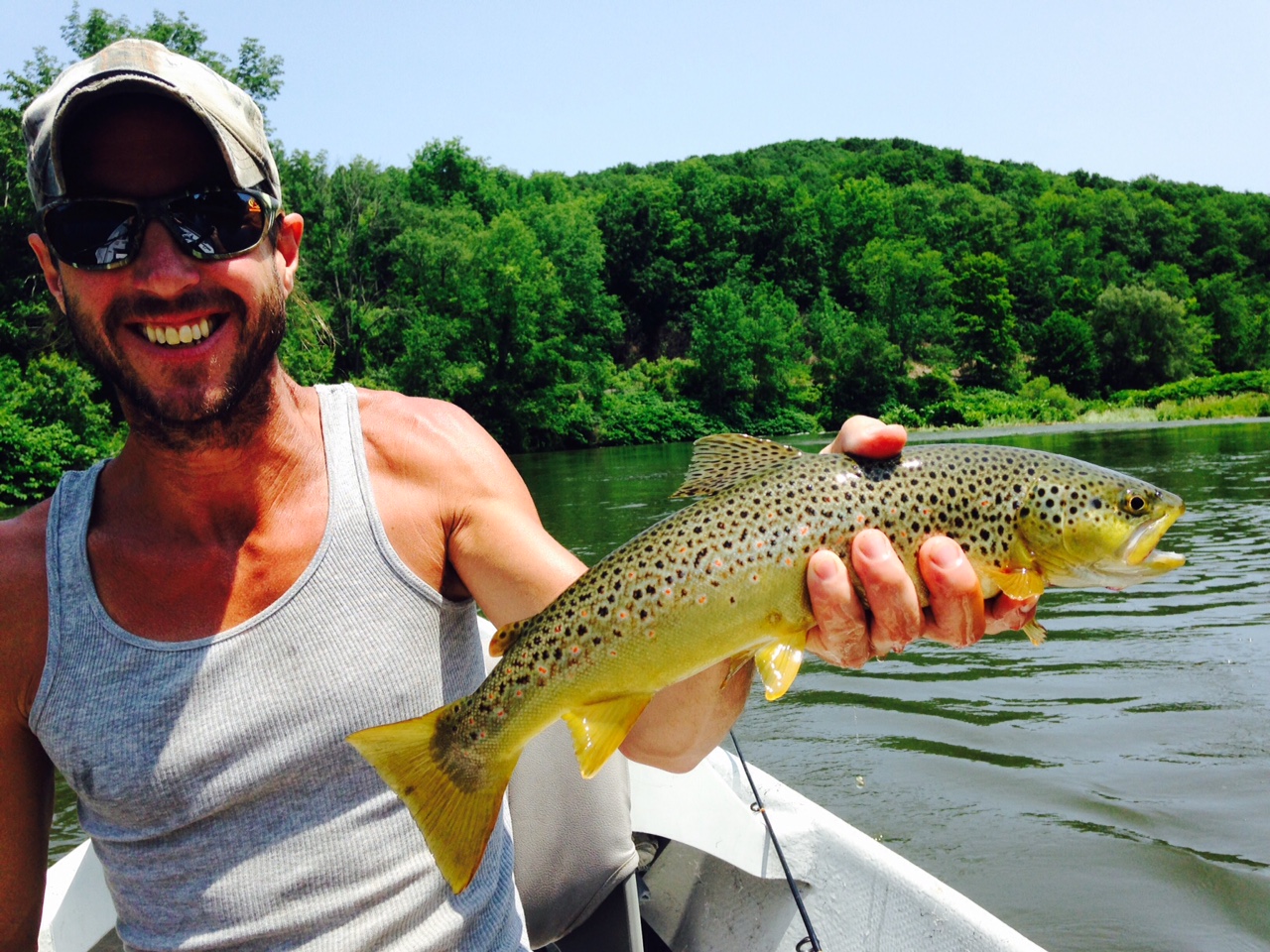 7/3/15 Matt holding this beautiful 17" West Branch Brown trout!