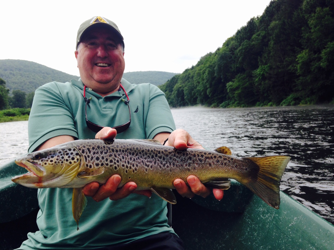 7/7/15 Ed holding one of a few 18" Brown trout boated this day.