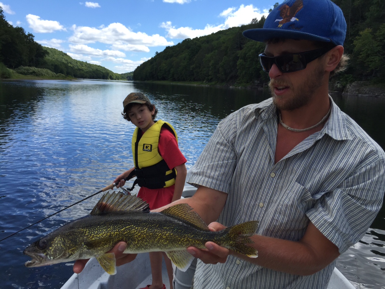 8/28/15Jacob and Guide Evan displaying an 18" Walleye