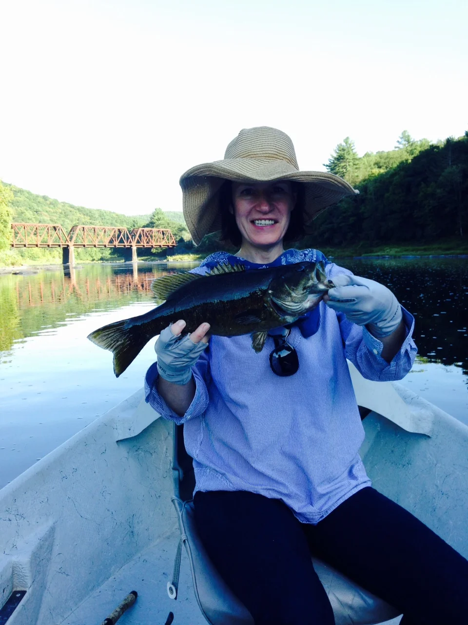 09/16/15Krystyna slams a 16" smallmouth on this evening